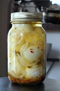 A long standing family tradition, these simple to make Pickled Eggs are a must have during card games and games nights. No canning required! #pickledeggs #eggs #gamesnight