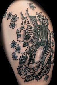 Black and grey realism Geisha piece with floral accents/background