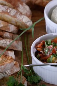 Fresh herbs, tomato, Boursin cheese, and ciabatta bread is a delicious combination for a delicious appetizer. For the final product and recipe check out my blog or my YouTube channel, "Hungry for Home"!