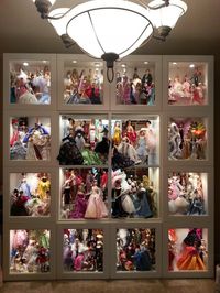 I like this glass window / door display case idea because it will cut down on dust collecting on my Barbie dolls that aren't in their boxes. | Home • Barbie Collector