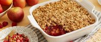 Frozen raspberries, harvested and flash-frozen at their tangy-sweet peak, are great to have on hand in the depths of winter and year-round. Here they’re baked with chopped apples into a cozy, crowd-pleasing crumble-topped treat.