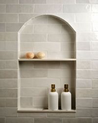 A simple tiled niche in the guest bathroom at project Indus Park