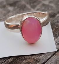 Opal Ring Pink Opal Ethiopian Pink Peach Opal Ring Red Flash 1.5 Ct  Solid Opal not a Doublet Sterling Silver Ring  US Sizes 6.0 and 7.0 Well Made Ring      Nickle Free Lead Free Very Well Made Sterling Silver Setting  Natural Ethiopian Opal   Natural Opal  Opal Measures appx. 10 x 8 mm OpalstarStudio BY SEASTAR Ships Quick From Right Here in the U.S.A.