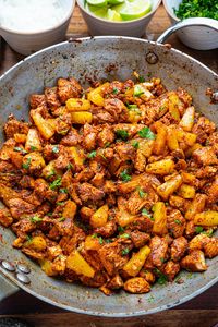 A quick and easy version of al pastor using a tasty marinated chicken that's cooked in a skillet.