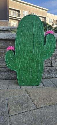 I draw and create my designs all from scratch! Only using nice quality materials shows in the results. This cute Cactus Pinata measures 24 inches tall and 17 inches wide. You will need a pinata stick to break it open, you can use candy and small toys to fill it up.