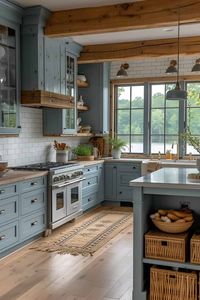 Light blue shaker cabinets bring a coastal charm to this kitchen design. Brass hardware and wood shelves enhance the beachy vibe. These kitchen cabinet ideas are perfect for a breezy, seaside-inspired space. Consider adding elements like subway tiles and natural textures. Explore the full range of kitchen cabinet inspirations with a tap