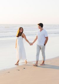 southern california engagement session / Gracie Shafqat photography / laguna beach engagement session / swimsuit engagement session / couples photo shoot posing inspiration / beach engagement session / Orange County photographer / San Diego photographer / sunrise engagement session / sunset engagement session /