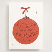 This minimalist Holiday card features a retro illustration of an ornament, hanging from a bow, complete with fun seemingly handwritten text.