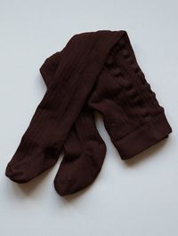 Made with cozy organic cotton, our ribbed knit tights feature an elastic waistband, soft seams, and the perfect amount of stretch for a comfortable fit. We especially love them with our Velvet Dress and Suede Boot. • Composition: 80% organic cotton, 15% polyamide, 5% elastane • Available in: BRONZE, CHOCOLATE, OATMEAL,