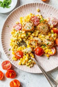 Scallops pair beautifully with sweet summer corn and tomatoes, made creamy with Boursin cheese. #scallops #corn