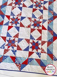 Hometown Stars is a double star block design made with large blocks and an accent border pieced right into the blocks. This pattern is 10" square and fat quarter friendly, adding in a background fabric and an accent fabric. This is a PRINTED quilt pattern which will be mailed to you. Hometown Stars Quilt Pattern Features: Includes 8 Sizes! Baby, Lap, Throw, Large Throw, Twin, Full, Queen, and King. Precut Friendly - 10" squares, charm squares, or fat quarters Skill Level - Advanced Beginner Fabr