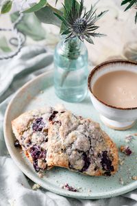 Cherry Scones are delicious sweet scone recipe full of citrus, vanilla, almond, and cherry flavor. Easy breakfast scone recipe! #cherryscones #sconerecipe #sweetscones #twocupsflour