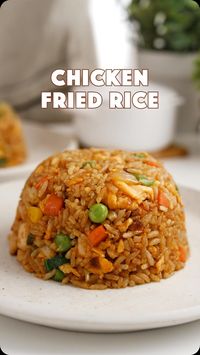 Easy, delicious Chicken Fried Rice Recipe. Ingredient Chicken 200 grams/7oz Cooked rice 4 cups or two servings Garlic 2 cloves Onion 1 Spring onions 2-3 Mixed diced vegetables, frozen or fresh, 2 cups ( about 200 g ) Cooking oil 2 tbsp ( sunflower, peanut, or vegetable oil ) Sesame oil 2 tsp Egg 2 Salt to taste For stir-fry sauce Regular soy sauce 2 tbsp Dark soy sauce 2 tsp Oyster sauce 2-3 tbsp White pepper half tsp Sugar 1 tbsp Instructions Combine regular soy sauce, dark soy sauce,...