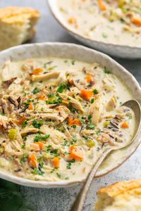 Light up the fire, grab your favorite book, and cozy on up with a bowl of this delicious Creamy Chicken and Wild Rice Soup. This dish comes together easily and is perfect for freezing for later!