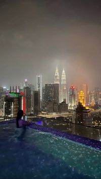 hotel in the heart of Kuala Lumpur malaysia skyline view infiny pool  destination asia tour south east asia SEA trip vacation kuala lumpur KL malaysia singapore hotels holidays all inclusive sunset view city view KLCC