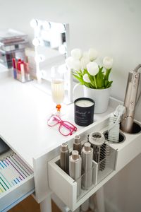 Add a hair tools organizer to the side of your desk to create an area that doubles as a work and GRWM station.