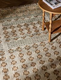 This flatweave rug is made of a blend of jute and wool and has a low pile and durable materiality. Shop this durable floor rug for a high-traffic area.