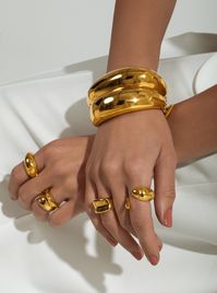 Throughout time humans have looked to the stars for inspiration. Handcrafted in bronze, plated in a choice of 22k Gold or Silver Rhodium, the Tavros Stackable Rings are inspired by the classic form of the bull's silhouette, an elevated representation of how distant constellations and cosmos can find form in sculpture.