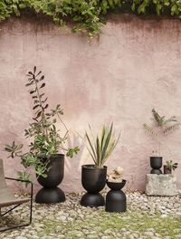 As the days slowly become longer and brighter, our desire to create an outdoor space that we can enjoy throughout the spring and summer months is sparked. Use our elevated and voluminous Hourglass Pots to create a mobile garden filled with your favourite green plants and flowers.