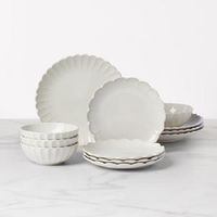 Introducing a fresh and feminine new design to celebrate the 10 year anniversary of French Perle] This 12-piece dinnerware set is a twist on the classic country look with its clean, elegant motif, beautiful ruffles and tea-stained finish. For distinct cafe charm, mix French Perle Scallop with any of our other coordinating collections, like Classic, Groove and Bead. Bon appetit]