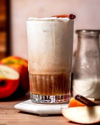 This iced apple crisp nondairy cream chai latte has the best sweet cream on top flavored with a homemade apple brown sugar syrup.