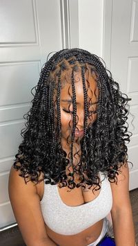 Shoulder length boho braids with curls