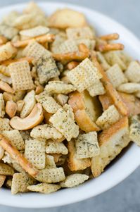 Dill Pickle Chex Mix - my alltime favorite Chex Mix! Chex cereal, bagel chips, pretzel sticks, and cashews coated in a buttery dill pickle and ranch seasoning and baked until crispy and delicious.