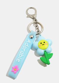 Get these "ADORABLE" flower wristband keychains featured in multiple styles! Add these adorable keychains to your keys. Multiple colors Holds keys together Durable