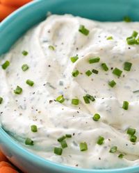 Perfect for football parties or any gathering, this creamy vegetable dip is full of garlic and herb flavors!  Plain ranch can't hold a candle to this easy veggie dip! #dip #diprecipe #vegetables #veggiedip #partyfood #snacks