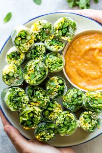 Green summer rolls with mango miso sauce make for a perfect warm weather food. They are easy to make and enjoyable to eat dipped in a deliciously sweet and salty mango miso sauce. Naturally vegan and gluten-free too.