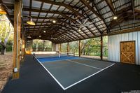 A San Antonio mansion with a covered pickleball court and a two-story pool house is now for sale