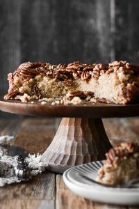 A high altitude tested pecan upside down cake is a pecan lover’s dream that tastes like pecan pie, but with a layer of soft, moist pecan cake underneath. This recipe features a moist, one layer pecan cake made with ground pecans, topped with sweet and crunchy caramelized pecans.