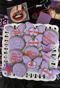 olivia rodrigo decorated GUTS sugar cookies (yes ik love is embarassing is missing)  #oliviarodrigo #guts #sour #oliviarodrigocookies #gutscookies #baking #sugarcookies