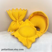 "This listing is for one pillow. Pick your favorite or make it a set! This Pasta Shaped Pillows will brighten up any room!  It is a cute decor for a living room, play room, nursery, beach houses, etc. It makes a perfect gift as well. It is handmade from soft fleece and filled with non-allergenic fiberfill.  Ravioli pillow size - 12\" by 12\" Tortellini pillow size - 12\" by 10\" Farfalle Pillow size - 15\"by 11\" All products are handmade by me in a smoke-free environment."