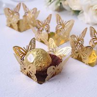 PRICES MAY VARY. Quantity: 50 Mini Dessert Liners Material: Paper Color: Metallic Gold Style: Hollow Design Butterfly Truffle Cups Overall Size: 4"L x 4"W Butterfly Size: 1.25"L x 1.5"W Base Size: 1.5"L x 1.5"W Thickness: 225 GSM Assembly Required: Yes, they are shipped flat. Simply fold to assemble. Features: Premium Quality, Odorless, Light, Compact, Easy to Use Note: Do not place wrappers in the oven. For decorating purposes only. High Quality Material: Made with shimmery pearlescent paper. S