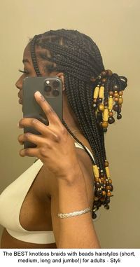 We're sharing the hottest knotless braids with beads hairstyles for the year! #braidedhairstyle