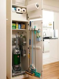 Cleaning storage in laundry room. Love this utility closet for the vacuum and other cleaning supplies for the mudroom