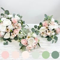 "Blush Pink and White Bridal Bouquet Collection 💕Each bouquet has blush pink cosmos and roses with realistic rose leaves - plus white babies breath and garden roses 💕Premium wedding quality artificial flowers and faux greenery including lambs ear and eucalyptus 💕3 bouquet sizes to choose from: small 9x12\", medium12x14\", large15x15\" 💕Perfect size for bride, bridesmaids & flower girls 💕Elegant blush pink and white faux florals 💕10 different satin ribbon options. Just make a note in the order personalization instructions during checkout to select your ribbon color"