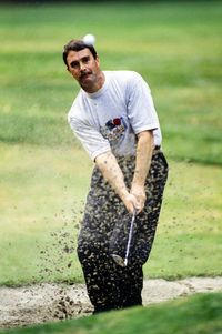 Nigel Mansell plays golf.  Italy, September, 1992.