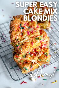 Cake Mix Blondies use ingredients you have at home and only take 30 minutes to bake. They’re the perfect snack and kids love them. #cakemixblondies #funfettiblondies #easyblondiesrecipe