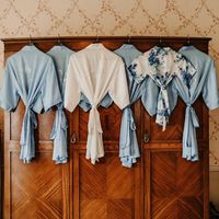 This beautiful Powder Blue silk dressing gown is available in one size and in over 35 Matchimony colours. Perfect for you and your maids Bachelorette Party or to wear whilst getting ready for your special day! It can also be made in smaller sizes to fit your flower girls too - please see our separate Matchimony listing. It can be purchased plain or customised with 'Bride', 'Bridesmaid', 'Maid of Honour', 'Mother of The Bride' or 'Mother of the Groom' in diamantes on the back. Alternatively it ca