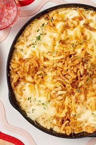 If you could pack all the savory flavors of French onion dip, smoky cheeses, fried onions, and roasted chicken into one dish, you'd say it was worth a million dollars—so we did! Our million dollar chicken and rice recipe has layer upon layer of deeply savory, umami richness from onion dip, cream of onion soup, and dry onion soup mix. The sautéed sweet onions paired with the onion soup really adds a nice base for the quick rice to soak up and cook in. The chicken is all throughout you get plenty in each bite. Finally, the crispy fried onions on top add a much needed crunch to the dish. #recipeideas #recipes #milliondollarchicken #chickenrecipes #chickendinner