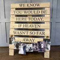 Rustic wedding memorial pallet sign Handmade with the following message 'We know you would be here today, if heaven wasn't so far away' Sign is freestanding with hinged supporting rear leg Constructed from FSC certified spruce with twisted jute rope and brass hinge Supplied with jute rope with miniature wooden pegs for displaying photos  79cm x 59cm Due to the nature of the material and the handmade construction every sign will be unique Supplied fully assembled Free delivery