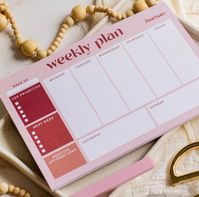 "Weekly Planner Notepad with Tear Off Sheets! Plan your weeks out strategically by using this easy tear-off notepad to coordinate your efforts and maximize productivity. 50 Sheets per notepad  Notepad size is 8.5\" x 5.5\"  Easy tear-off sheets with cardboard backing"