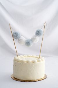 Festive baby shower cake topper pom pom cake garland by TeamBee, $12.00