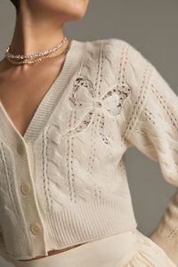 Add a touch of coziness to your close-knit circle with the Leota Cardigan showcasing a pointelle knit, v-neckline, and cropped fit. | Leota Cardigan Sweater by LoveShackFancy in White, Women's, Size: Medium, Wool/Cashmere at Anthropologie