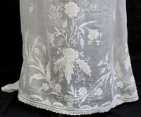 Whitework embroidery on the hem of a muslin Regency gown