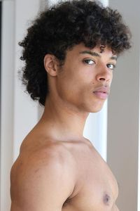 Join the curl revolution with the Curly Mullet featuring Coils or Kinks, a bold and expressive style showcased in our collection of 22 ruling men's hairstyles for 2024! Embrace the unique texture, click for more inspiration, and follow us for the latest trends. #CurlyMullet #CoilsAndKinks #CurlyHair #Mullet #2024HairTrends