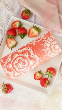 Get fancy with a stunning strawberry and cream roll cake gorgeously detailed with a lattice pattern design.