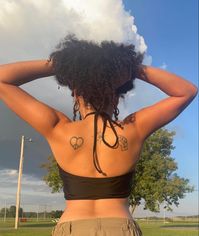 Eqaulity Fist, Sun, & Heart Peace Sign on back of shoulders